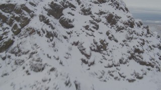 4K aerial stock footage approach snowy peak, Downtown Anchorage, Chugach Mountains, Alaska Aerial Stock Footage | AK0001_0572