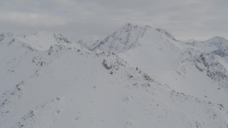 4K aerial stock footage flying over snowy ridges in the Chugach Mountains, Alaska Aerial Stock Footage | AK0001_0573