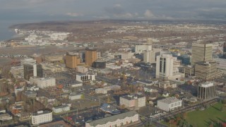 4K aerial stock footage flying by Downtown buildings, Downtown Anchorage, Alaska Aerial Stock Footage | AK0001_0587