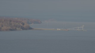 4K aerial stock footage flying by a pier, Knik Arm of the Cook Inlet, Point MacKenzie, Alaska Aerial Stock Footage | AK0001_0592