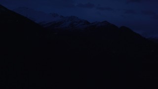 4K aerial stock footage flying by communications tower, Chugach Mountains, Anchorage, Alaska, sunrise Aerial Stock Footage | AK0001_0606