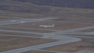 Tracking E-3 Sentry landing, Elmendorf Air Force Base, Alaska Aerial Stock Footage | AK0001_0672