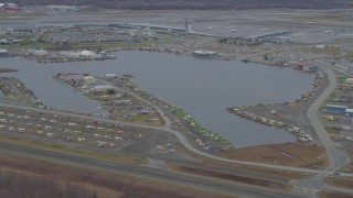 4K aerial stock footage Lake Hood Seaplane Base, Ted Stevens Anchorage International Airport, Anchorage, Alaska Aerial Stock Footage | AK0001_0678