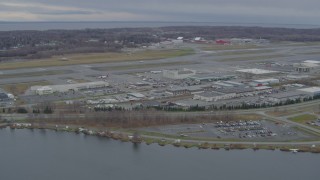 4K aerial stock footage Lake Hood Seaplane Base, Ted Stevens Anchorage International Airport, Anchorage, Alaska Aerial Stock Footage | AK0001_0679