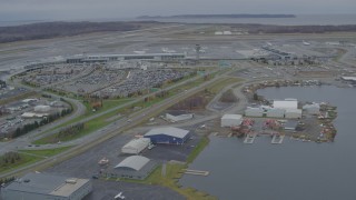 4K aerial stock footage Lake Hood Seaplane Base, Ted Stevens Anchorage International Airport, Anchorage, Alaska Aerial Stock Footage | AK0001_0680