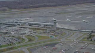 4K aerial stock footage flying by Ted Stevens Anchorage International Airport, Anchorage, Alaska Aerial Stock Footage | AK0001_0681