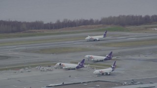 AK0001_0683 - 4K aerial stock footage cargo jet taking off, Ted Stevens Anchorage International Airport, Anchorage, Alaska