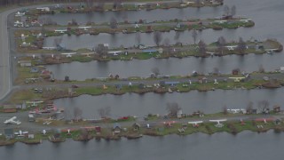 4K aerial stock footage seaplanes parked in Lake Hood Seaplane Base, Anchorage, Alaska Aerial Stock Footage | AK0001_0684