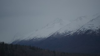 4K aerial stock footage flying by snow-capped peaks, Chugach Mountains, Alaska Aerial Stock Footage | AK0001_0714