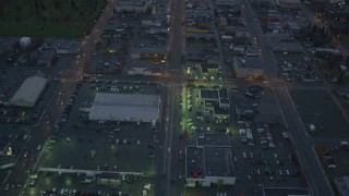 4K aerial stock footage following East 6th Street, revealing Downtown Anchorage, Alaska, twilight Aerial Stock Footage | AK0001_0727