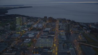 4K aerial stock footage West 6th Ave to West 3rd Ave, winter, Downtown Anchorage, Alaska, twilight Aerial Stock Footage | AK0001_0731