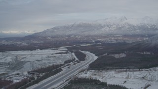 AK0001_0743 - 4K aerial stock footage Glenn Highway, Eagle River Valley, Chugach Mountains, Eagle River, Alaska