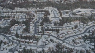 4K aerial stock footage snowy residential neighborhood, Eagle River Valley, Eagle River, Alaska Aerial Stock Footage | AK0001_0749