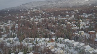 4K aerial stock footage snowy residential neighborhood, Eagle River Valley, Eagle River, Alaska Aerial Stock Footage | AK0001_0750