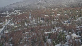 4K aerial stock footage snowy residential neighborhood, Eagle River Valley, Eagle River, Alaska Aerial Stock Footage | AK0001_0751