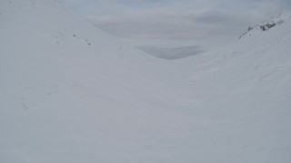 4K aerial stock footage snowy ridge, Knik Arm of the Cook Inlet, Palmer Slough, Chugach Mountains, Alaska Aerial Stock Footage | AK0001_0769