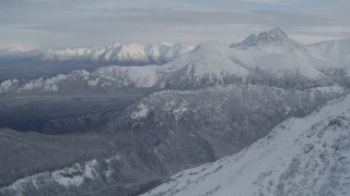 4K aerial stock footage approaching snow-covered ranges of Chugach Mountains, Alaska Aerial Stock Footage | AK0001_0770