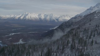 4K aerial stock footage approaching Knik River Valley, near snowy Chugach Mountains, Alaska Aerial Stock Footage | AK0001_0780