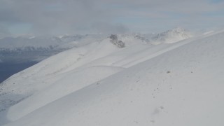 4K aerial stock footage over snowy summit in the Chugach Mountains, Alaska Aerial Stock Footage | AK0001_0814