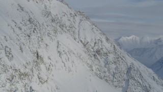 4K aerial stock footage approaching snowy slope, ranges, Chugach Mountains, Alaska Aerial Stock Footage | AK0001_0829