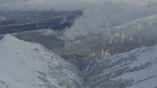 4K aerial stock footage tilt to the Matanuska River Valley, snowy Chugach Mountains, Alaska Aerial Stock Footage | AK0001_0845