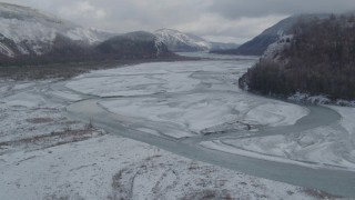 AK0001_0851 - 4K aerial stock footage descend between Chugach, Talkeetna Mountains, Matanuska River Valley, Alaska