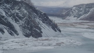 4K aerial stock footage descend toward the icy Matanuska River Valley, Alaska Aerial Stock Footage | AK0001_0857