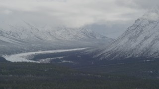 4K aerial stock footage flying by snow-covered Chugach Mountains, Matanuska River Valley, Alaska Aerial Stock Footage | AK0001_0882