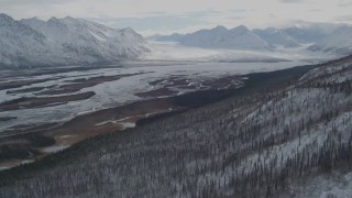 4K aerial stock footage approaching glacier at end of the snow covered Tazlina River Valley, Alaska Aerial Stock Footage | AK0001_0892