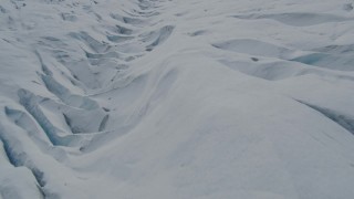 4K aerial stock footage flying over snow covered surface of the Tazlina Glacier, Alaska Aerial Stock Footage | AK0001_0923