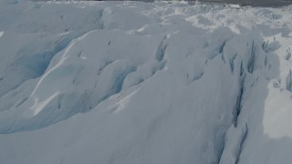 4K aerial stock footage flying over snow covered surface of the Tazlina Glacier, Alaska Aerial Stock Footage | AK0001_0934