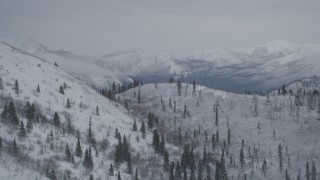 4K aerial stock footage flying by snowy slopes in the Chugach Mountains, Alaska Aerial Stock Footage | AK0001_0957