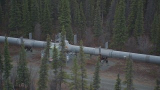 4K aerial stock footage orbiting station along pipeline, during winter, Trans-Alaska Pipeline, Alaska Aerial Stock Footage | AK0001_0979