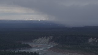 4K aerial stock footage flying over forest near a canyon and the Tazlina River, Alaska Aerial Stock Footage | AK0001_1041