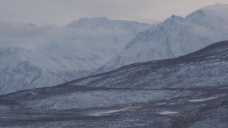 4K aerial stock footage flyby rolling hills and snow covered Chugach Mountains, Alaska Aerial Stock Footage | AK0001_1057