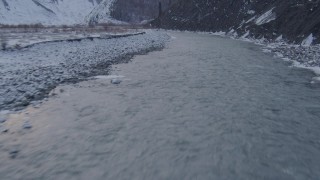 AK0001_1079 - 4K aerial stock footage following the Matanuska River in winter in the Matanuska River Valley, Alaska