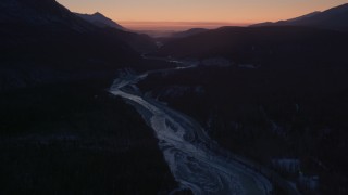 AK0001_1110 - 4K aerial stock footage video flying over the snow covered Matanuska River Valley at sunset, Alaska