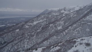 4K aerial stock footage flying above snow covered slopes in the Chugach Mountains, Alaska Aerial Stock Footage | AK0001_1169