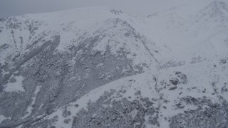 4K aerial stock footage flying toward snowy slope in the Chugach Mountains, Alaska Aerial Stock Footage | AK0001_1173