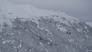 4K aerial stock footage flying toward snowy slopes in the Chugach Mountains, Alaska Aerial Stock Footage | AK0001_1185