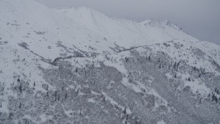 4K aerial stock footage flying toward snowy Chugach Mountain ridge, Alaska Aerial Stock Footage | AK0001_1186