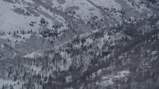 4K aerial stock footage pan across snowy river valley at base of Chugach Mountains, Alaska Aerial Stock Footage | AK0001_1187