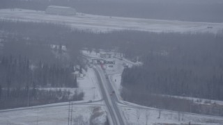 4K aerial stock footage a checkpoint on D Street near Bryant Army Heliport in snow, Anchorage, Alaska Aerial Stock Footage | AK0001_1319