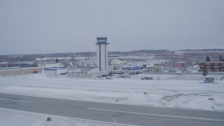 4K aerial stock footage the Merrill Field control tower in snow, Anchorage, Alaska Aerial Stock Footage | AK0001_1328