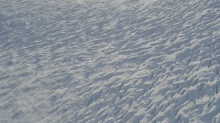 4K aerial stock footage the surface of the snow covered Knik Glacier, Alaska Aerial Stock Footage | AK0001_1387