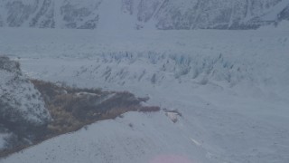 4K aerial stock footage the snow covered Knik Glacier at base of Chugach Mountains, Alaska Aerial Stock Footage | AK0001_1392