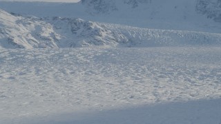 4K aerial stock footage the snow covered Knik Glacier spilling down the Chugach Mountains, Alaska Aerial Stock Footage | AK0001_1398