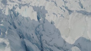 4K aerial stock footage the jagged, snow covered surface of the Knik Glacier, Alaska Aerial Stock Footage | AK0001_1417