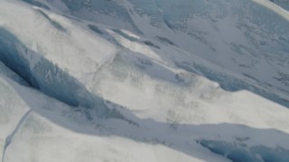 4K aerial stock footage the ridged, snow covered surface of the Knik Glacier, Alaska Aerial Stock Footage | AK0001_1419