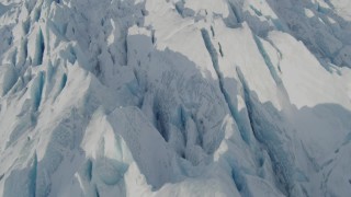 4K aerial stock footage the jagged, snow covered surface of the Knik Glacier, Alaska Aerial Stock Footage | AK0001_1420